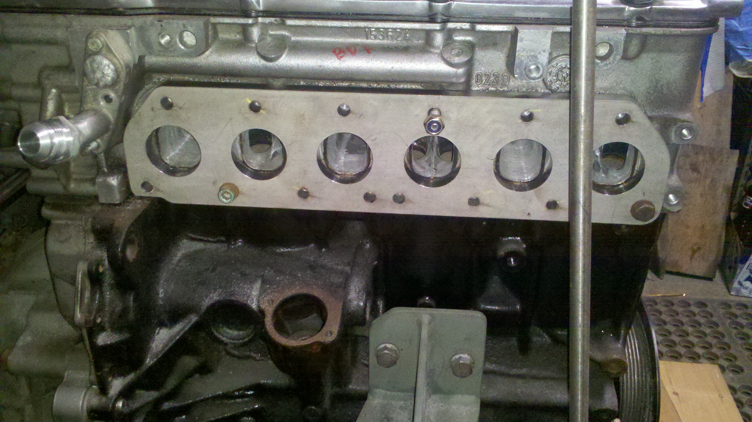 exhaust manifold flange bored and inplace.jpg