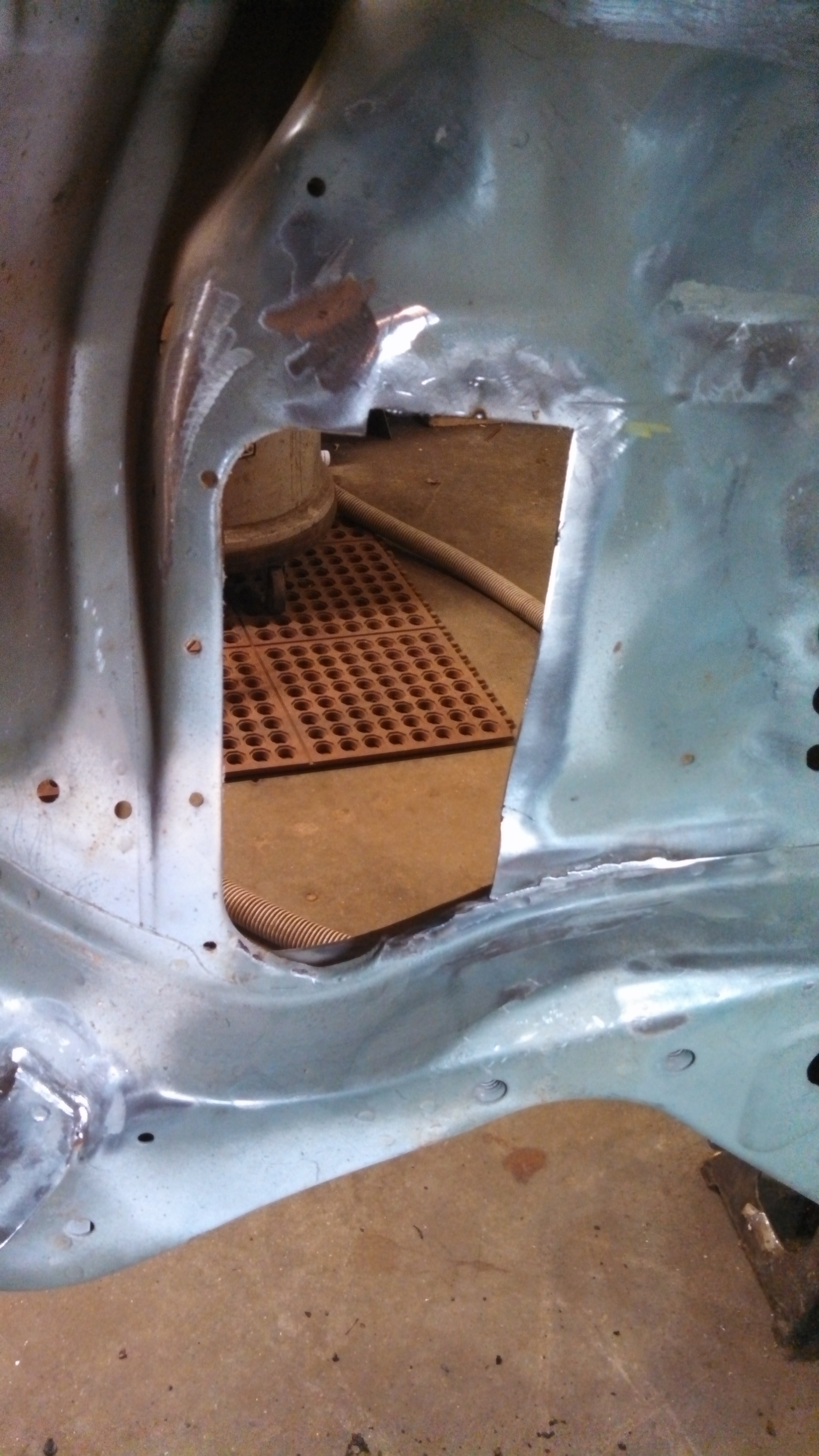 pass side steering arm hole cutout.jpg