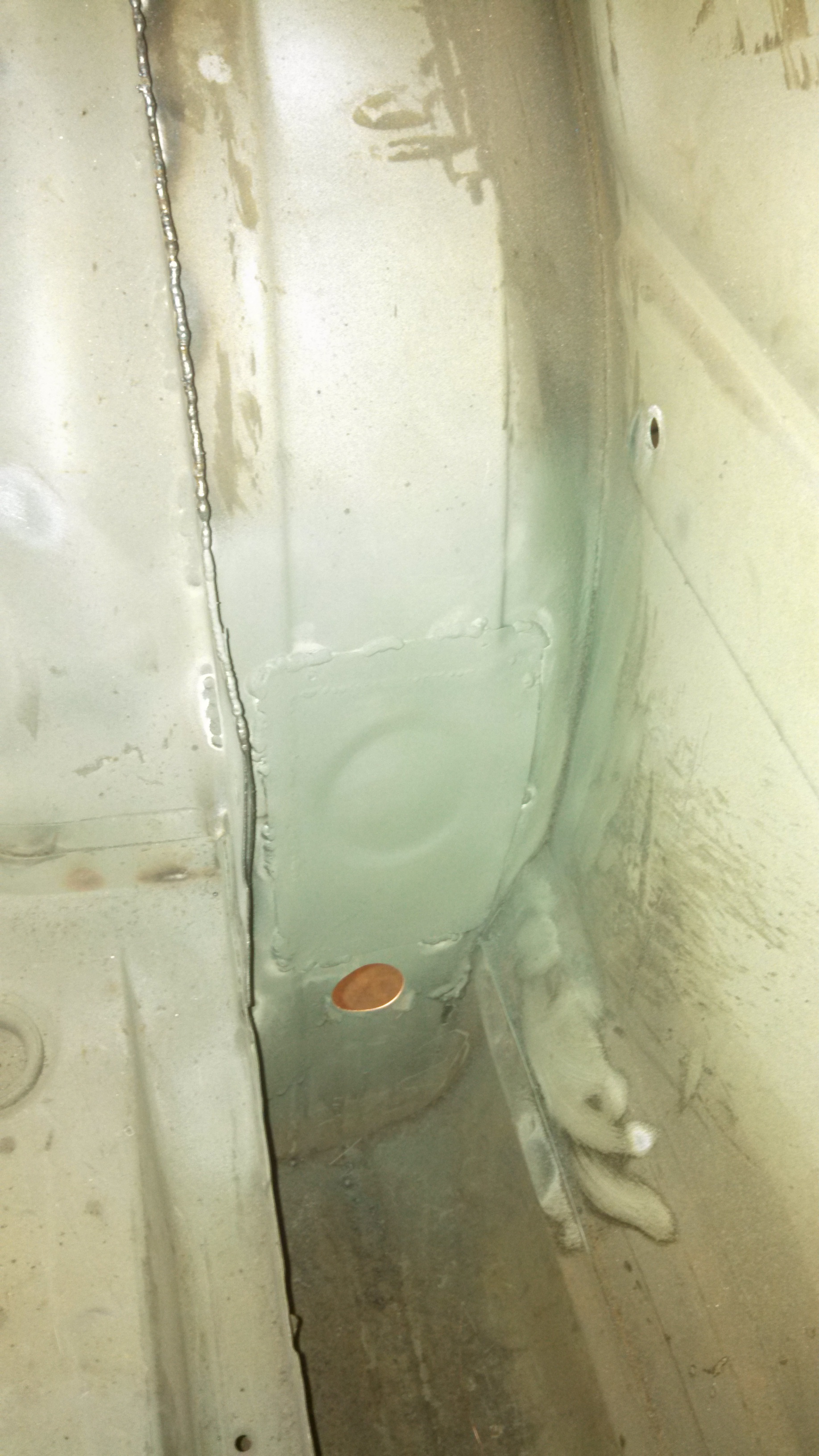 drivver rear wheel well patch.jpg