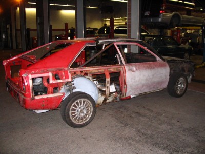 Coupe back end sitting on the 4k floor pan for the first time. Not pretty but sitting on . We now have a coupe!!