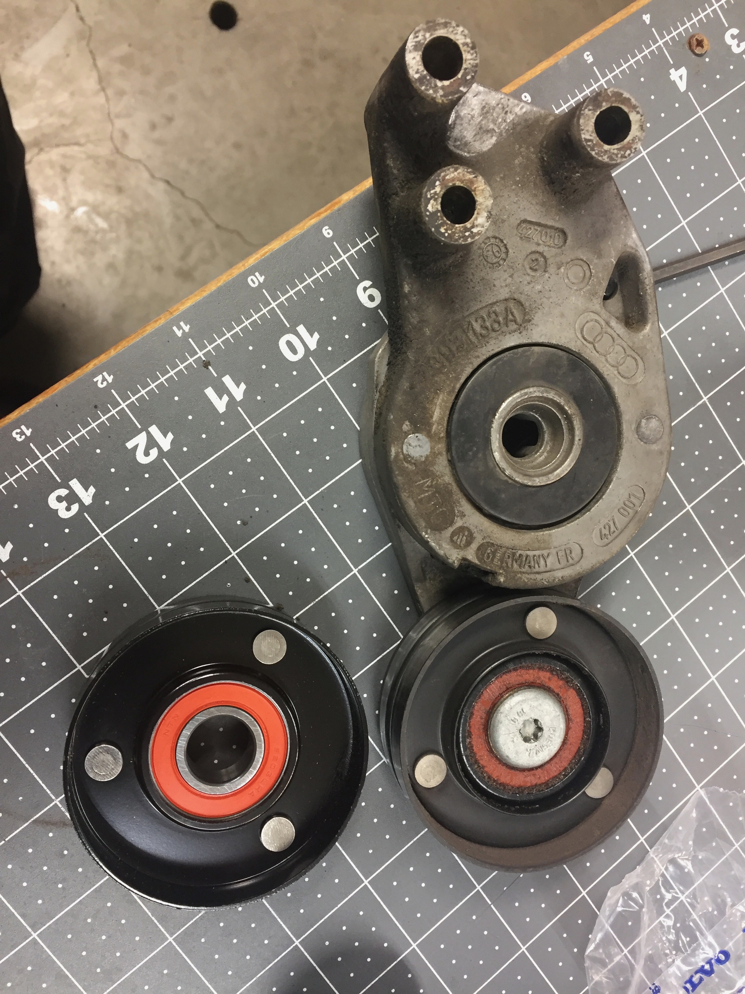 New pulley next to the old.